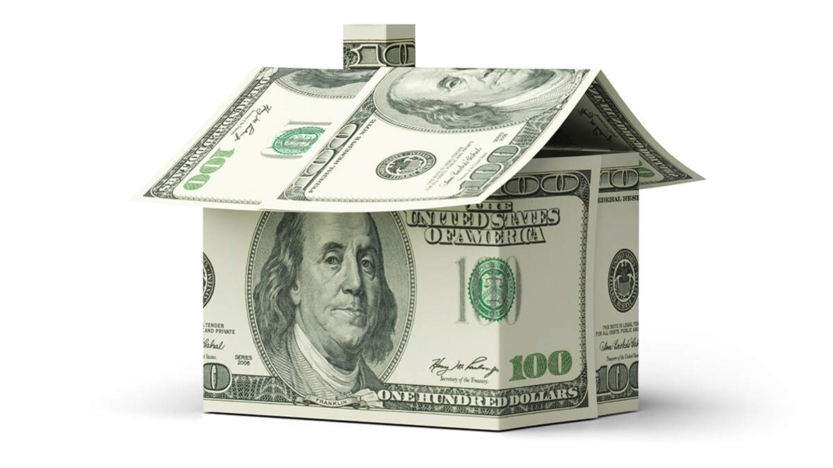 Money house dollar bill real estate isolated on white business finance wealth investment currency background of residential building property home mortgage concept or financial economy banking market.